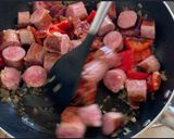 Foto del paso 5 de la receta Arroz con butifarra y puntas de jamón