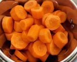 A picture of step 1 of Gajar Ka Halwa.