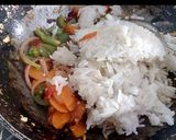 A picture of step 14 of Navratan pulao.