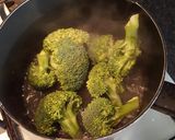 A picture of step 13 of Slow Cooked Shredded Beef. Roast Spuds and Roasted Broccoli.
