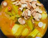 A picture of step 5 of Muniga badi jhola (Drumsticks & sun dried lentil dumplings).