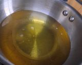 A picture of step 2 of Raw banana masala chips.