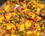 A picture of step 12 of Muttor paneer with laccha paratha.