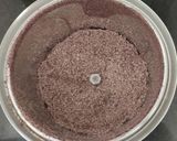 A picture of step 3 of Kavuni arisi coconut milk sweet.