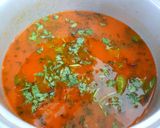 A picture of step 7 of Broken rice tomato bath.