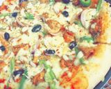 A picture of step 5 of Peri peri pizza without oven.