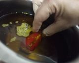 A picture of step 8 of Stuffed red chilli pickle.