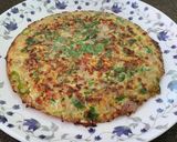A picture of step 8 of Masala Omelette.