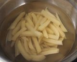 Foto del paso 4 de la receta Costillar adobado con patatas fritas