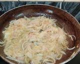 A picture of step 3 of KHAGINA (a savoury egg dish).
