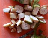 A picture of step 1 of Raw Banana and white peas curry.