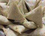 A picture of step 4 of Qeemay k Samosay (How to wrap samosa step by step).