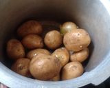 A picture of step 1 of Honey Chilli baby potatoes.