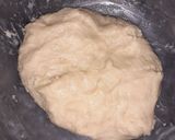 A picture of step 2 of Chocolate icing doughnuts.
