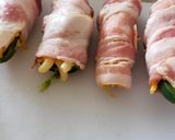 A picture of step 3 of Bacon wrapped Jalapeno Mac and cheese poppers.