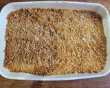 Foto del paso 4 de la receta: Crumble de duraznos y merengue