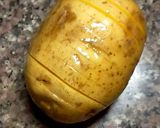 A picture of step 2 of Baked cheesy potatoe.