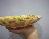 A picture of step 6 of Karari Rumali Roti.