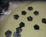 A picture of step 1 of How to Make Soccer Ball Onigiri (Rice Ball).