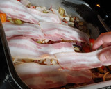 Foto del paso 7 de la receta: Pollo amb berenjena, bacon y patata panadera