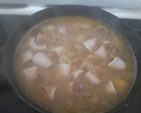 Foto del paso 4 de la receta: Dorada al horno con almejas, gambón, patatas y chipirones