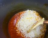 A picture of step 6 of Corn and beans palm oil rice.