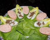 Foto del paso 4 de la receta: Endivias con salchicha alemana y  triangulitos de queso