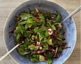 A picture of step 4 of Nutty fruity salad 🥬.