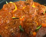 A picture of step 5 of Stuffed Bell Peppers with Tomato Sauce.