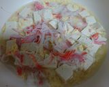 A picture of step 7 of Easy Fluffy Egg and Imitation Crab Tofu Stew.