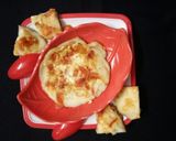 A picture of step 4 of Rice Tomato Paneer Uttapam.