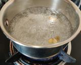 A picture of step 3 of Cardamom Tea.