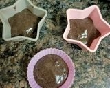 A picture of step 6 of Choco lava topped with Ganache.