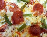 A picture of step 6 of My Over Loaded Pizza 😘.