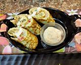 A picture of step 7 of Egg Crep Roll.