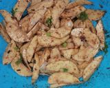 A picture of step 3 of Baked potato wedges.