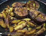A picture of step 7 of Stuff Brinjal with potato wedges.