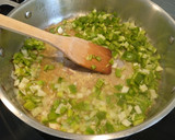 Foto del paso 4 de la receta: Calamares rellenos de arroz y langostinos