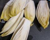 Une image de l'étape 1 de °Endives braisées à la crème et au curry°.