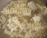 A picture of step 2 of Bread lasagna with noodles.