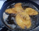 Foto del paso 12 de la receta: Filetes de pollo empanados con salsa de pimientos del Piquillo