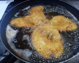 Foto del paso 12 de la receta: Filetes de pollo empanados con salsa de pimientos del Piquillo