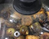 A picture of step 6 of Stuffed mushroom baingan masala.