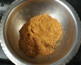A picture of step 1 of Baigan bhaja.
