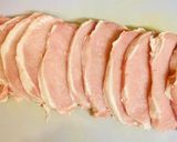 A picture of step 1 of Pork rolls with peaches.