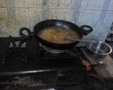A picture of step 11 of Chowmin biryani and chicken soup.