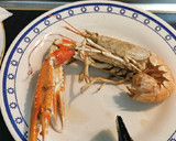 Foto del paso 3 de la receta: Calamar relleno de sus tentáculos, aletas y Cigala
