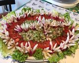 Une image de l'étape 10 de Salade de tomates,scarole,céleri et thon aux radis « fleurs ».
