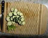 A picture of step 1 of Cashew Chicken with zucchini.