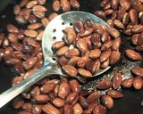 A picture of step 2 of Cocoa and Sugar Almonds.
